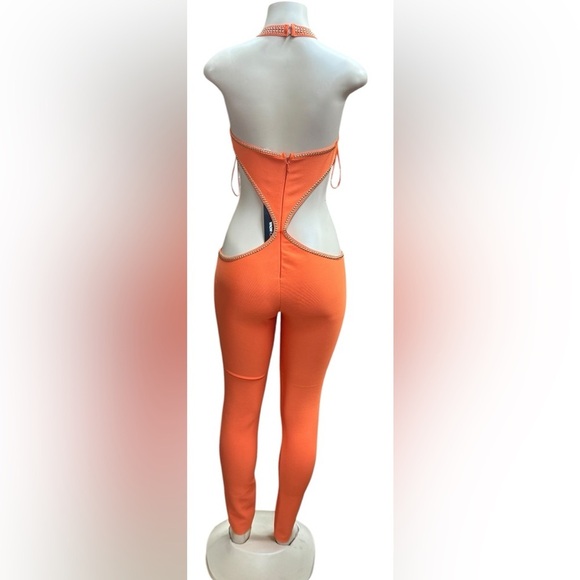 FASHION NOVA. Vibrant Orange Cutout Jumpsuit - Picture 5 of 7